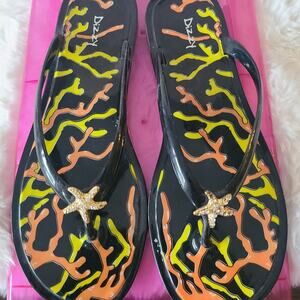 Dizzy Black Coral Jelly Flip Flops